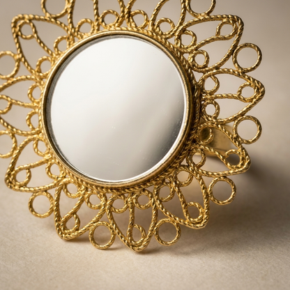 Aarsi mirror ring - macro detail of the mirror bezel and gold wirework