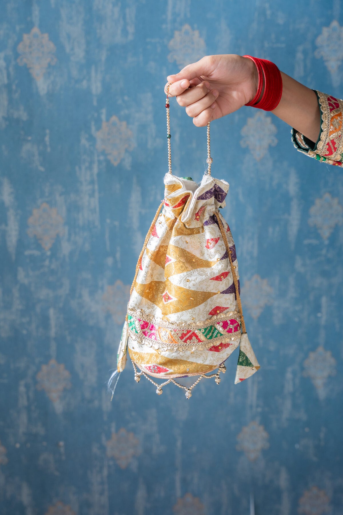 Rangrez gharara — potli bag styling, Husnaraa
